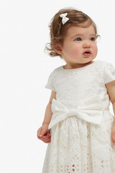 BABY GIRL CHARLOTTE MINI BOW DRESS in colour CLOUD DANCER