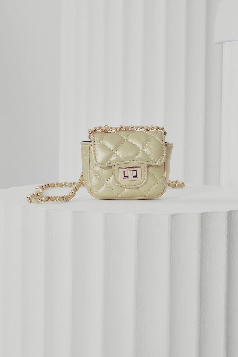 MINI QUILTED METALLIC BAG in colour GOLD