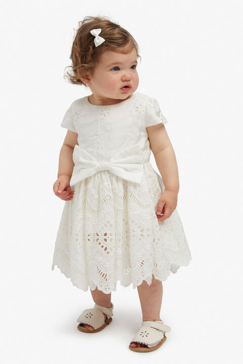 BABY GIRL CHARLOTTE MINI BOW DRESS in colour CLOUD DANCER